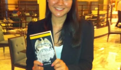 A reader holding the book Undercover